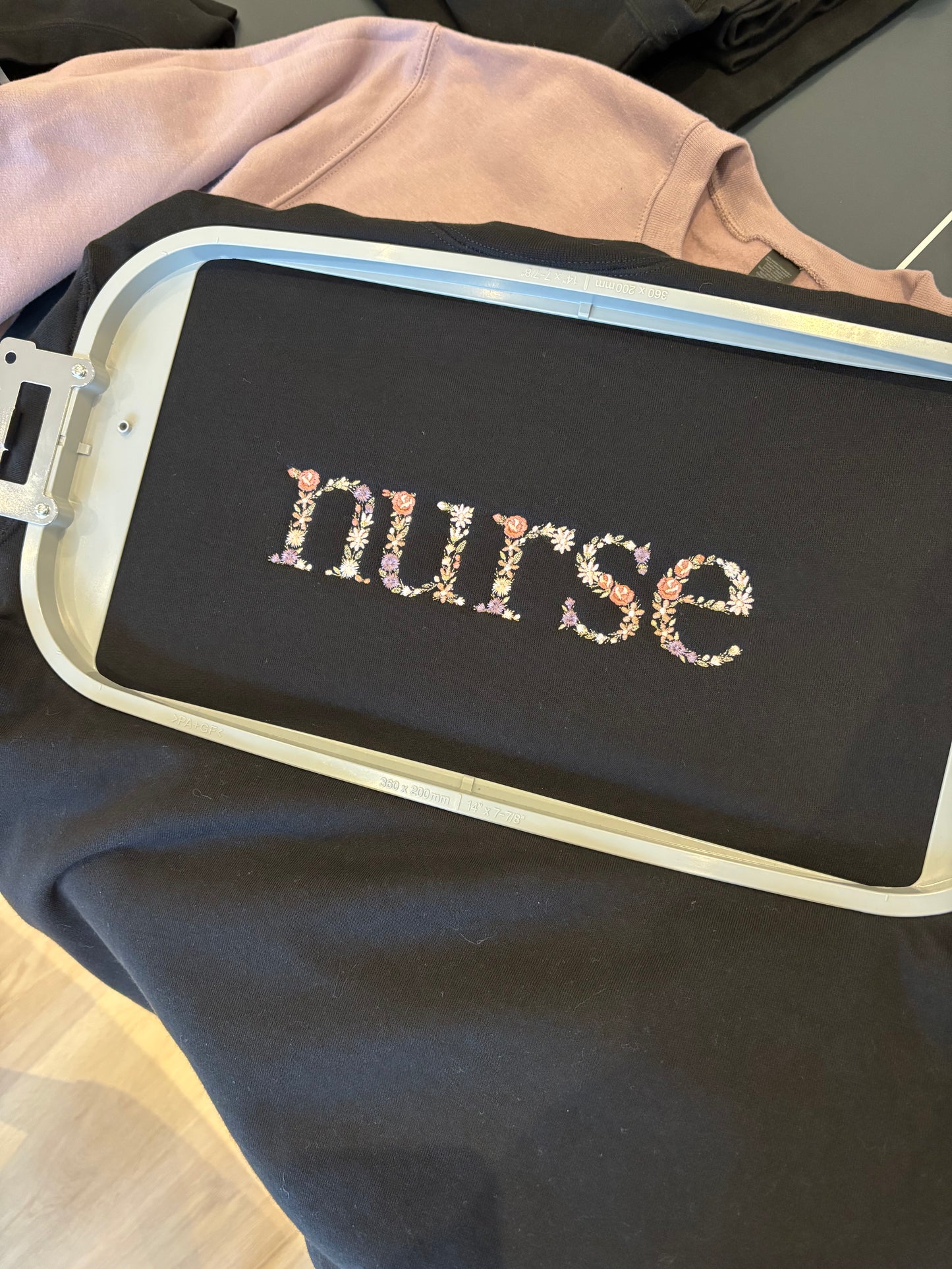 Floral "Nurse" Embroidered Sweatshirt